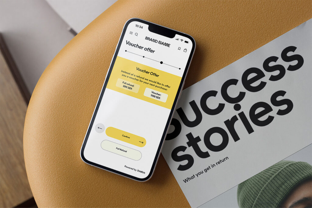 
A smartphone displays inretrn's management platform offering a voucher as a reconversion strategy. Nearby is a magazine titled "Success Stories" with a subtitle "What you get in return."